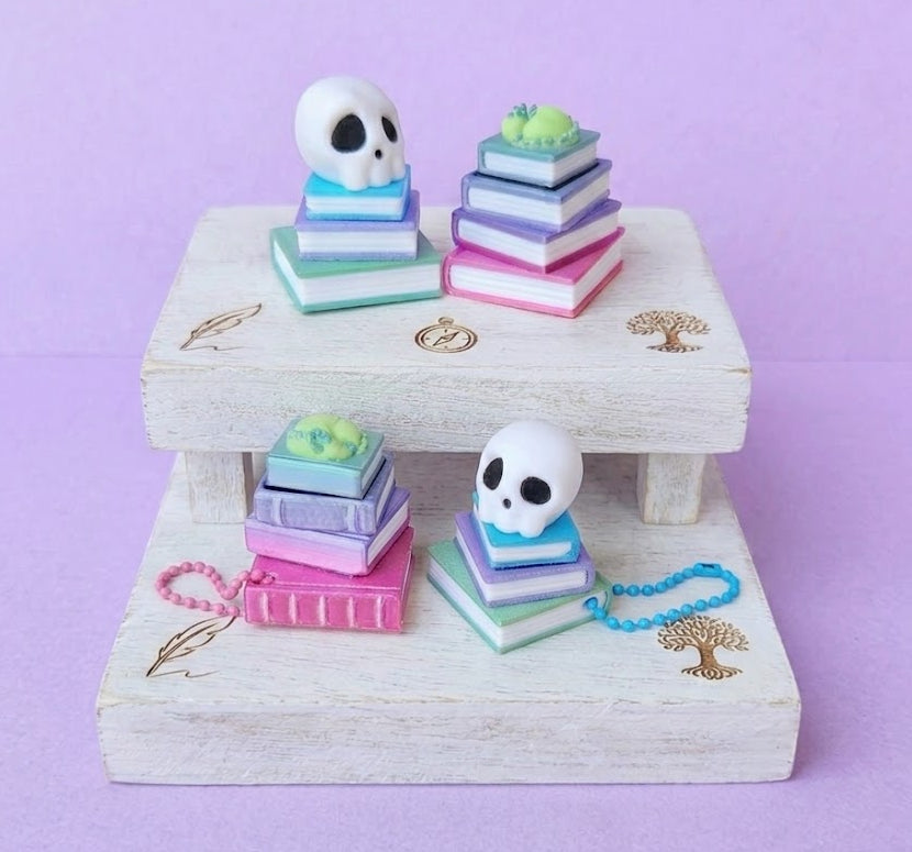 Skull or Sleepy Dragon Bookstack Clicker